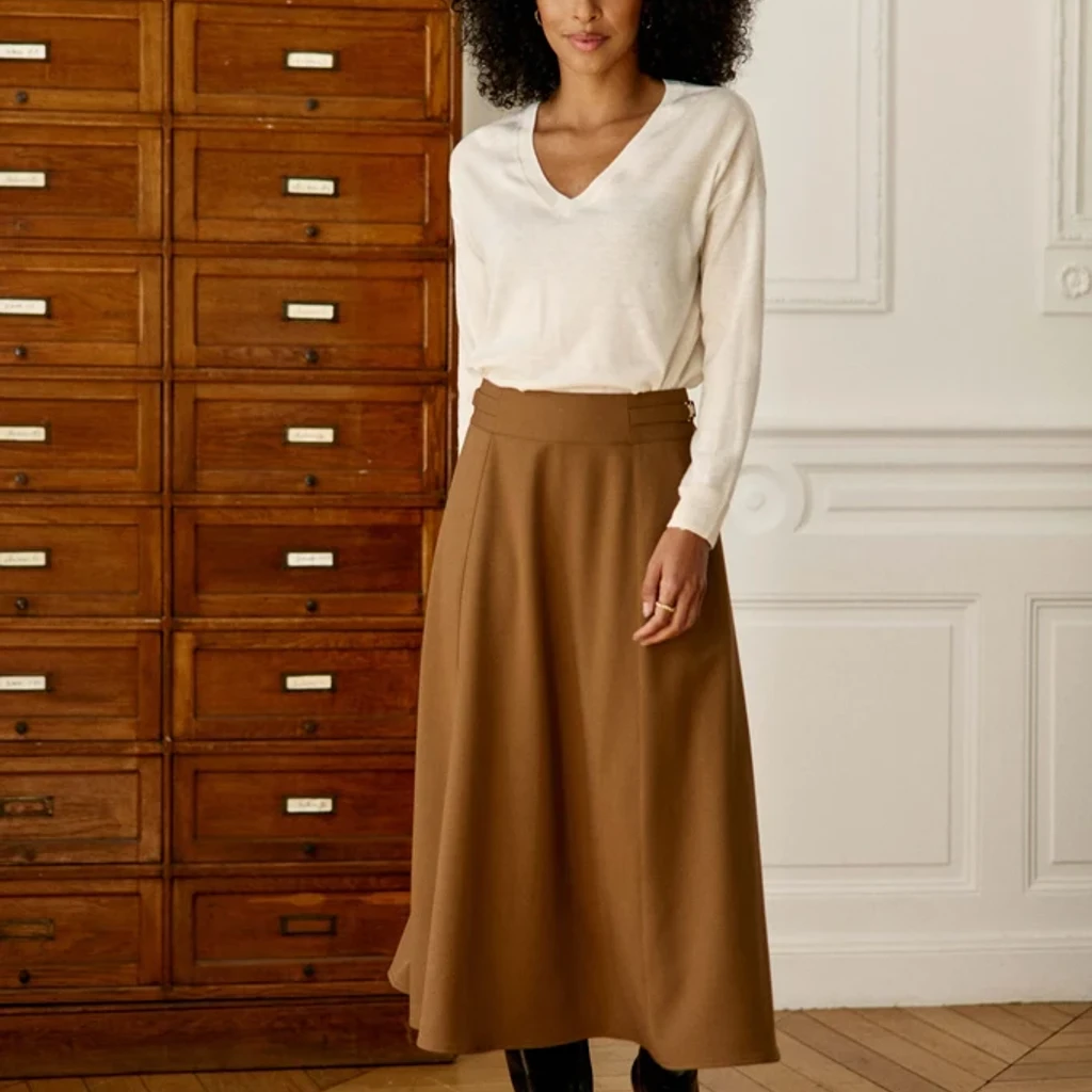 Camel midi skirt, the product as worn by the model