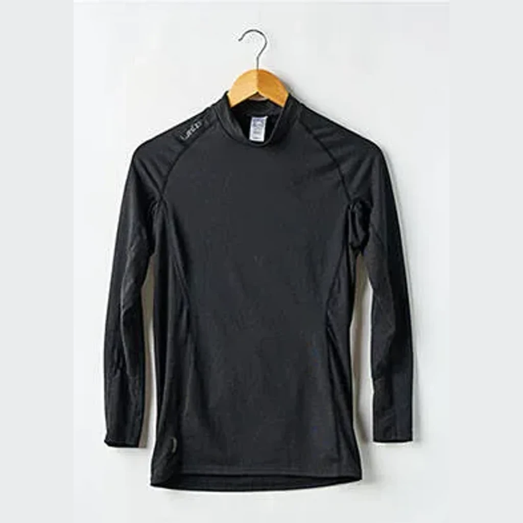 Photo produit inspirée de Wedze BL 500 — sous-vêtement thermique homme à demi-zip bleu clair et gris